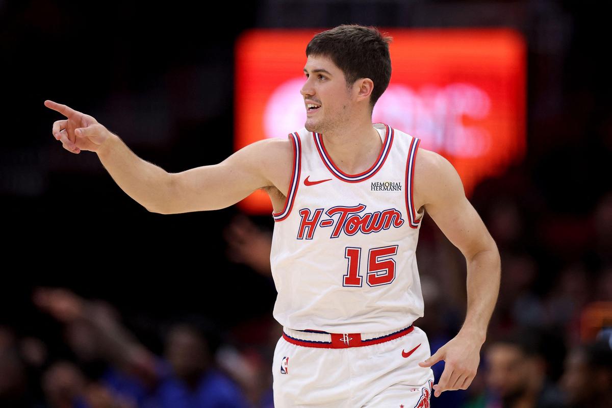 Reed Sheppard of the Houston Rockets celebrates after a 3-point basket.
