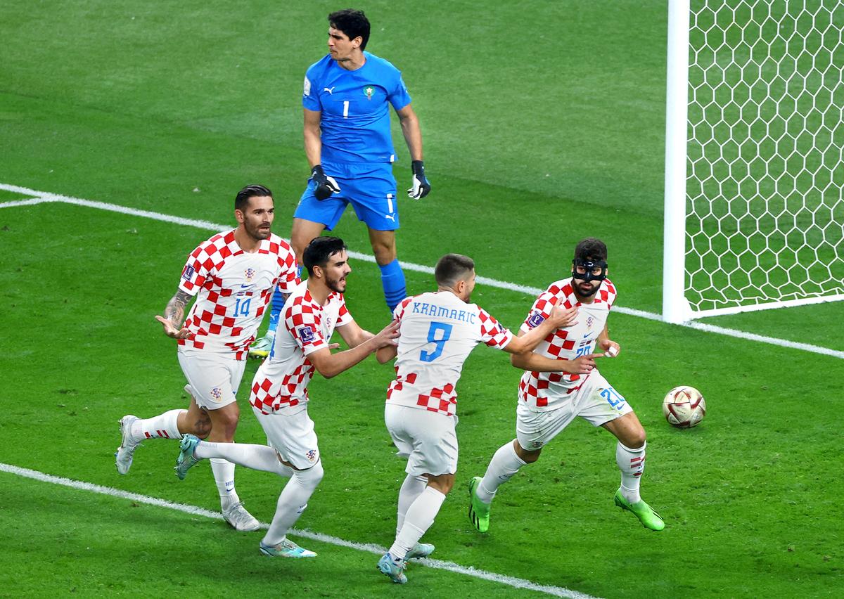 Croatia’s Josko Gvardiol celebrates with teammates after scoring a goal during the FIFA World Cup 2022 third-place playoff match against Morocco.