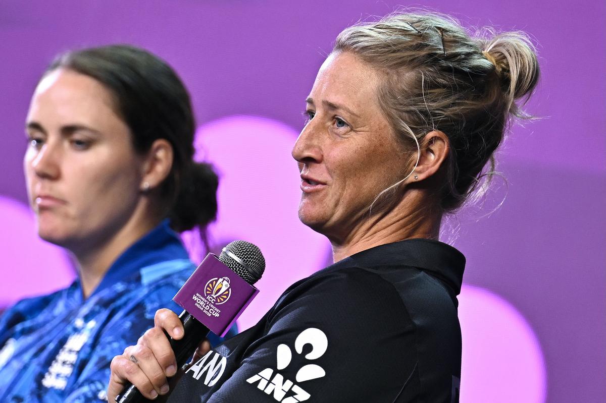 New Zealand’s captain Sophie Devine (R) speaks to media during the 2025 ICC Women’s Cricket World Cup Captains’ Day ahead of the start of the tournament in Bengaluru on September 26, 2025. 