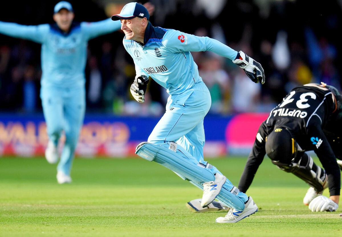 Jos Buttler celebrates running out Martin Guptill to seal victory for England during the final of the ICC Cricket World Cup 2019 against New Zealand at Lord’s on July 14, 2019.