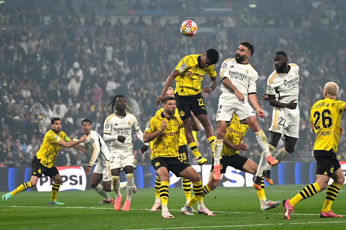 Leap of faith: A perfect header by Dani Carvajal (third from right) in the second half, assisted by a precise corner kick from Toni Kroos, broke the deadlock. 