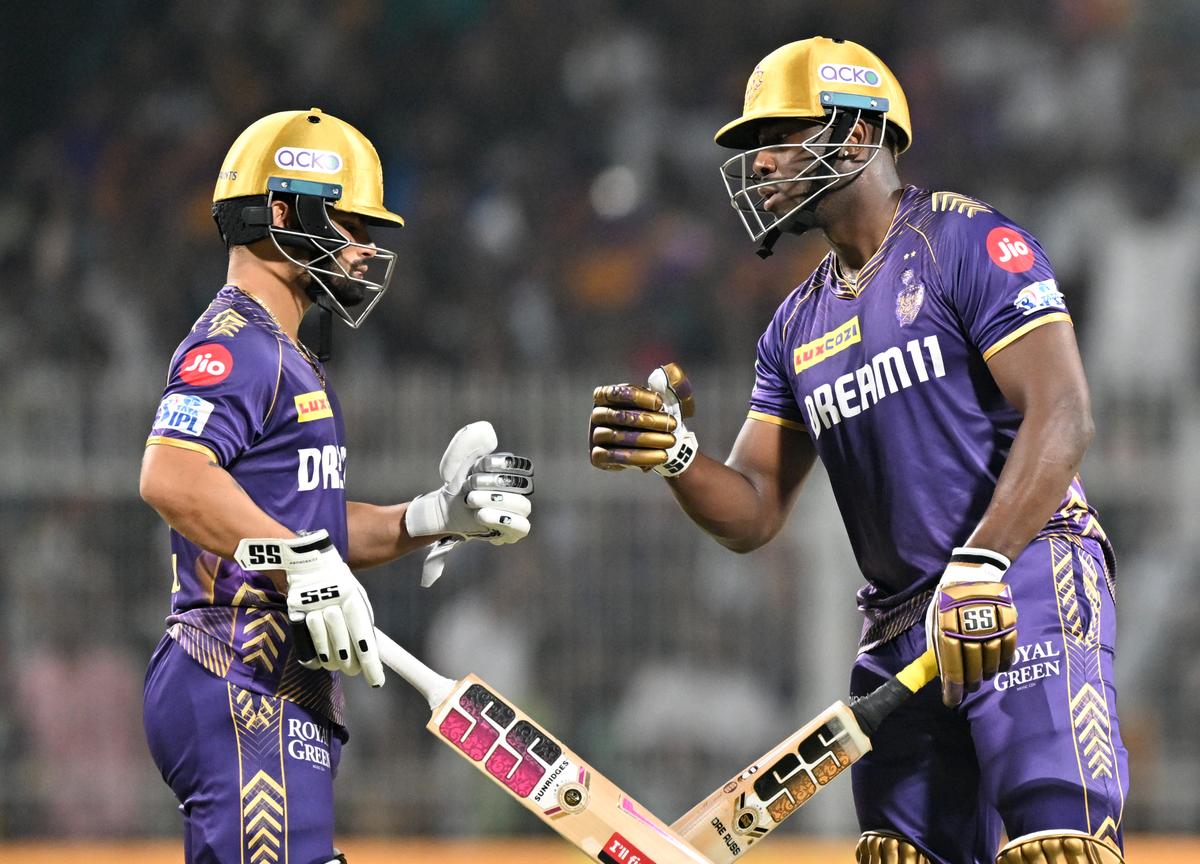 Andre Russell celebrates a boundary with Rinku Singh against SRH.