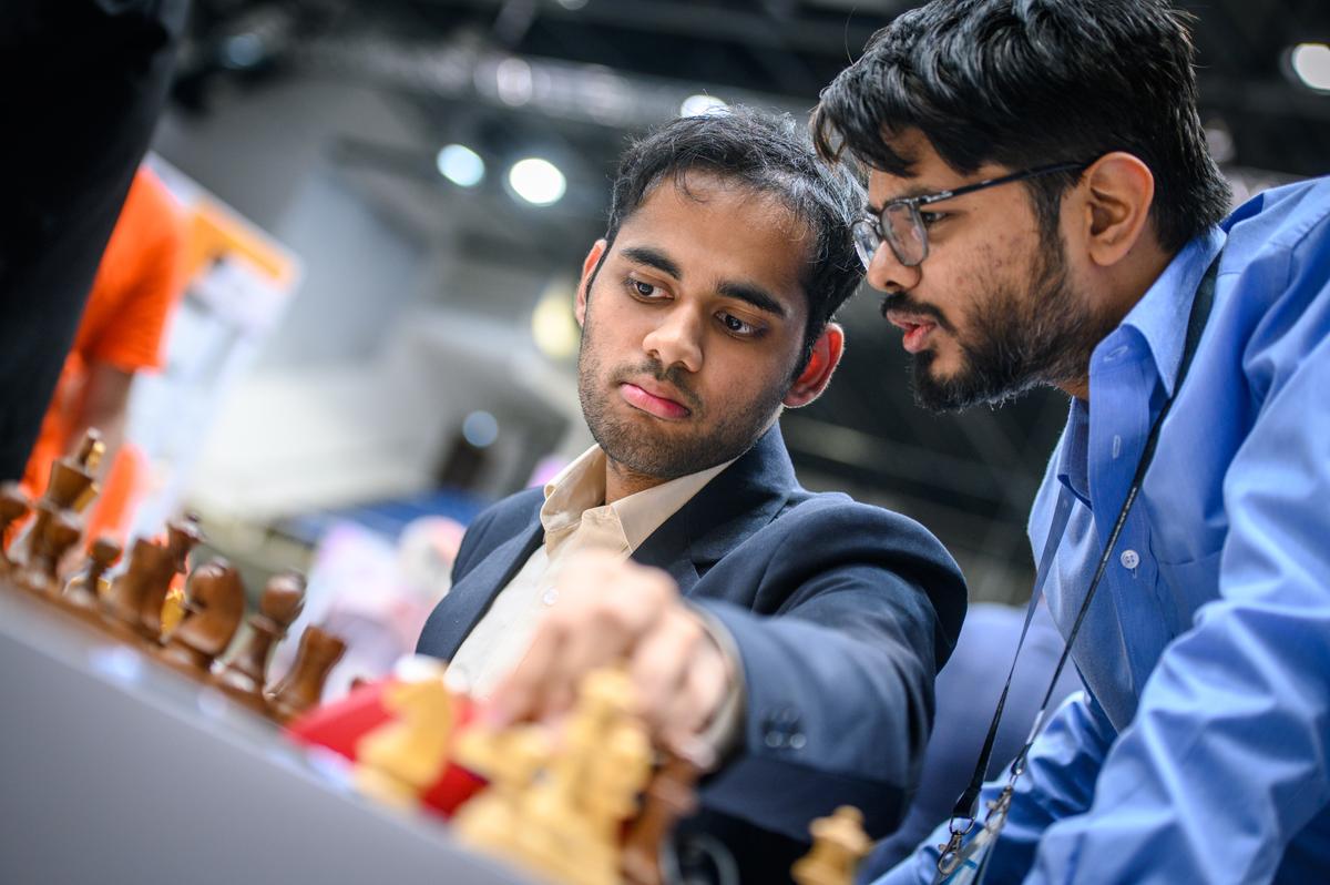 Arjun Erigaisi (left) with Srinath during the Chess Olympiad 2024.