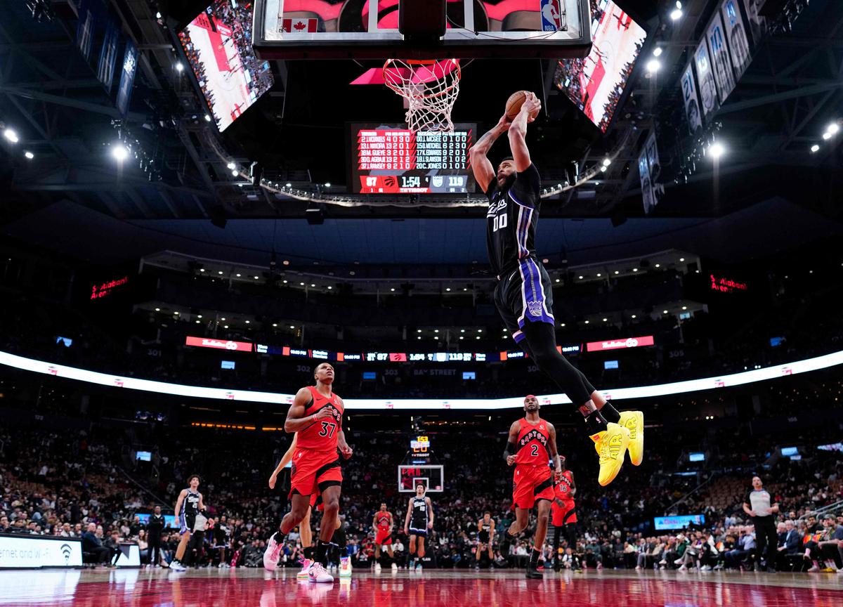 JaVale McGee of the Sacramento Kings dunks against the Toronto Raptors. 