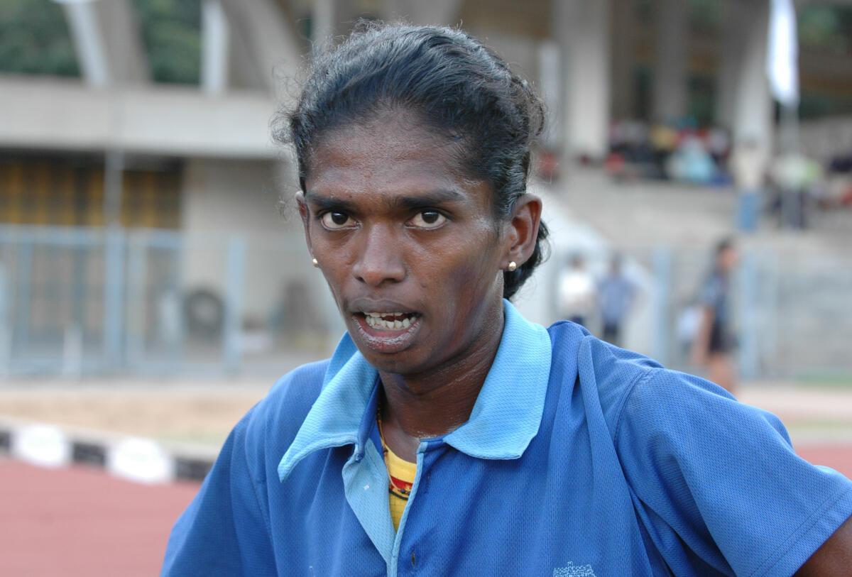 File Photo: S. Shanthi of Tamil Nadu, who created a national record in the women’‘s 3000 metres steeplechase event, looks on after winning the event in the 45th National inter-State senior athletics championship in Bangalore on July 4, 2005.