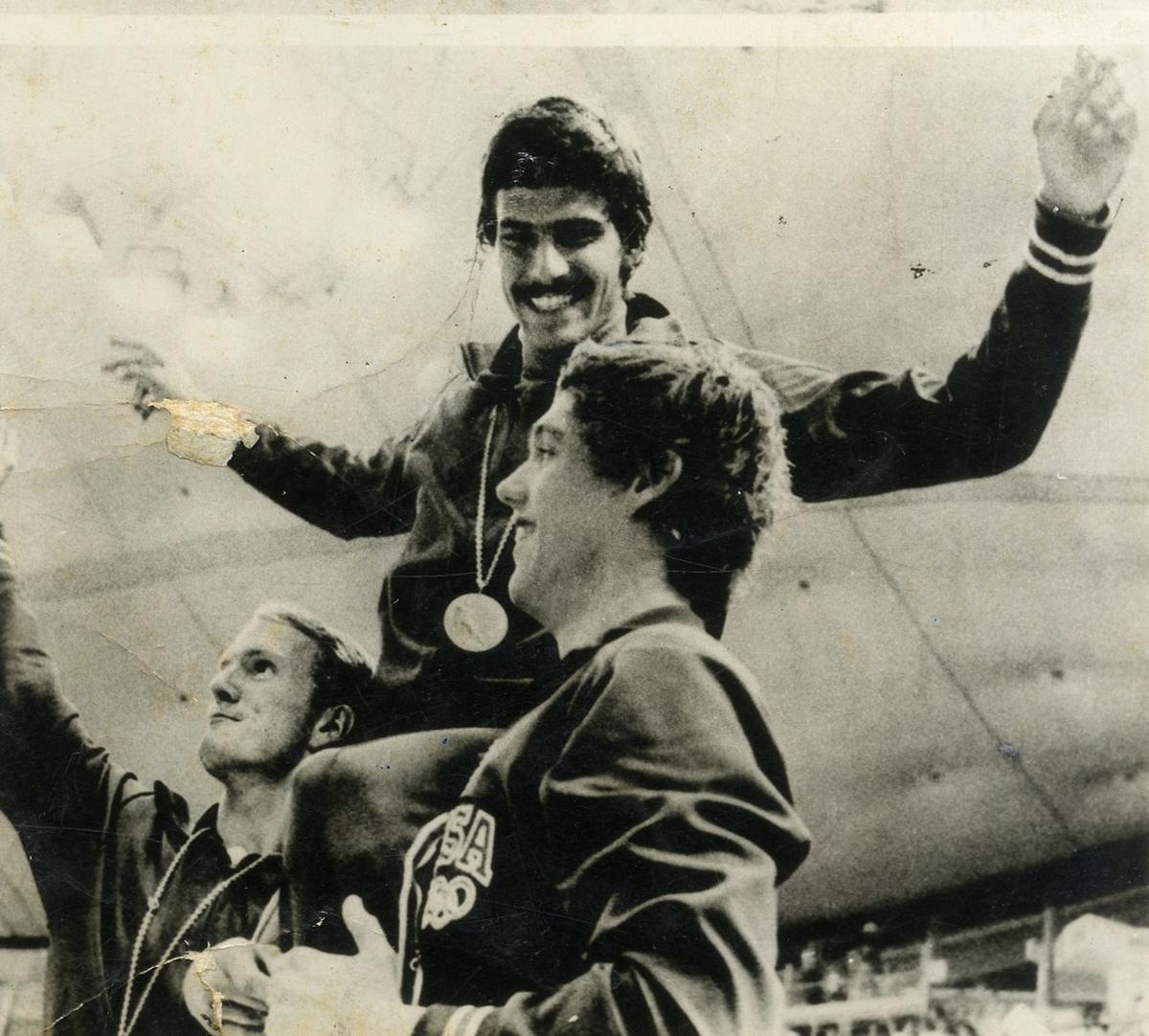 Mark Spitz is carried on the shoulders of his teammates following their victory at the 1972 Munich Olympics.