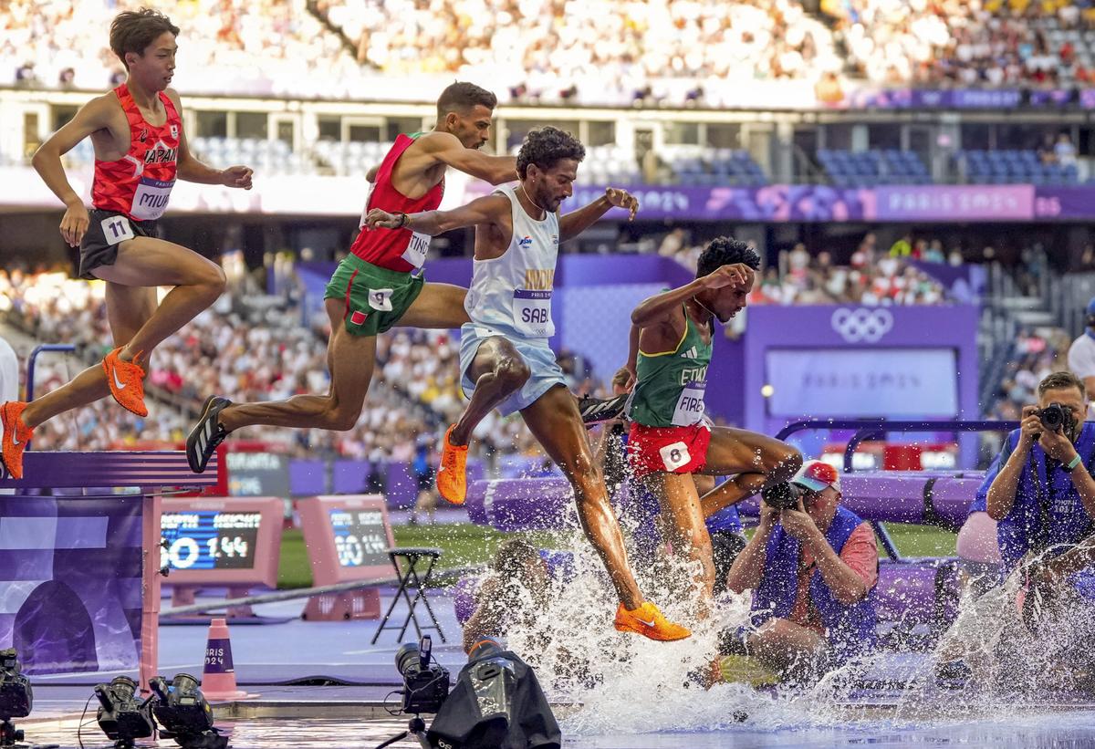 Lone ranger: Avinash Sable (in white), the men’s 3,000m steeplechase national record holder, was the only other Indian to reach a final, finishing 11th in his event. 