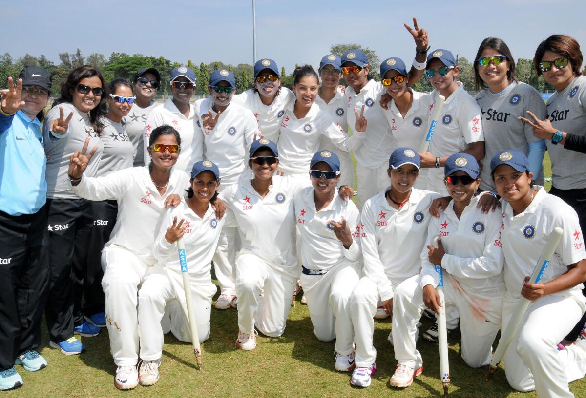 The Indian team after beating South Africa in a Test match in Mysore in 2014. 