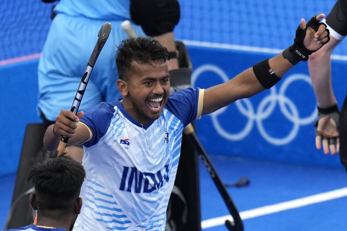 India’s Vivek Sagar Prasad celebrates after scoring his side’s second goal during the men’s Group B hockey match between India and New Zealand at the Yves-du-Manoir Stadium during the 2024 Summer Olympics, Saturday, July 27, 2024, in Colombes, France. 