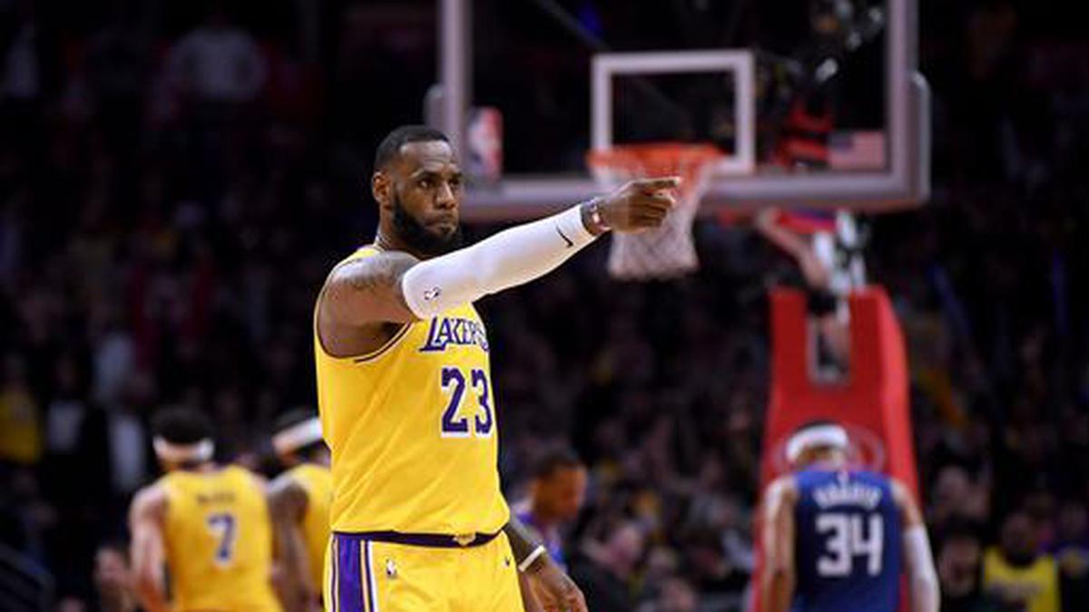 With LeBron back, Lakers outlast Clippers in OT 123-120