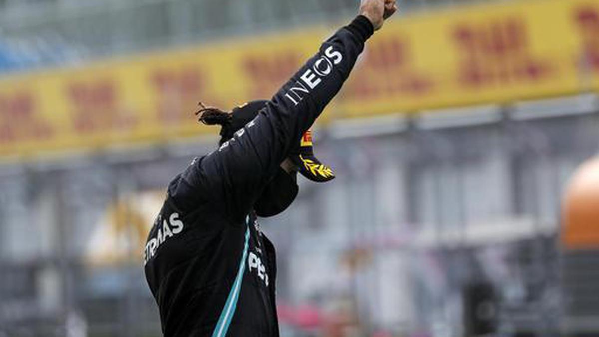 Lewis Hamilton raises fist after Styrian GP win