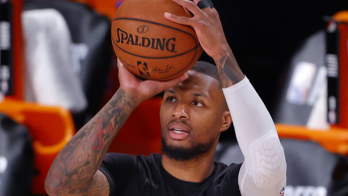 Lillard leaving bubble for tests on injured knee: Blazers