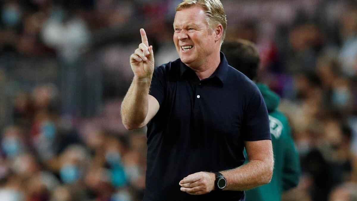 Barca chief Laporta offers Koeman backing but wants better football