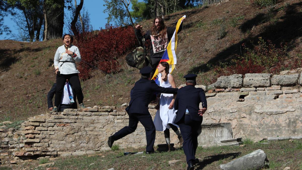 Protestors attempt to disrupt 2022 Beijing Winter Olympic flame lighting