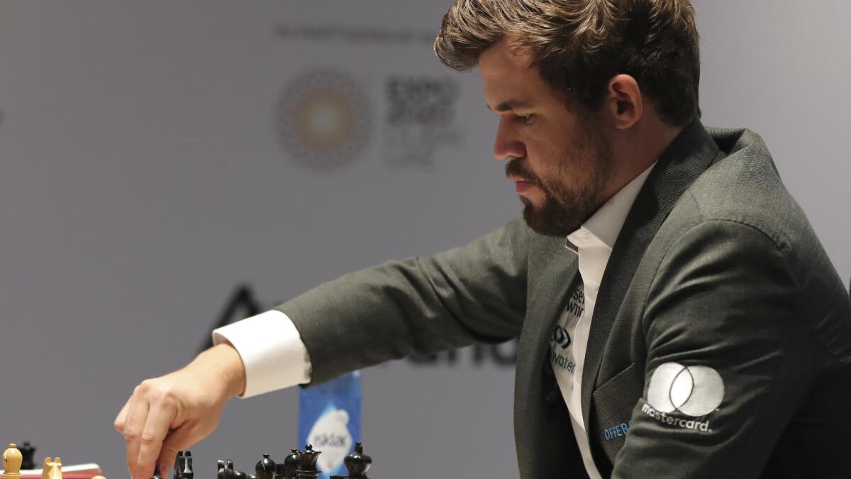 World Chess Championship: Carlsen presses for win in sixth game