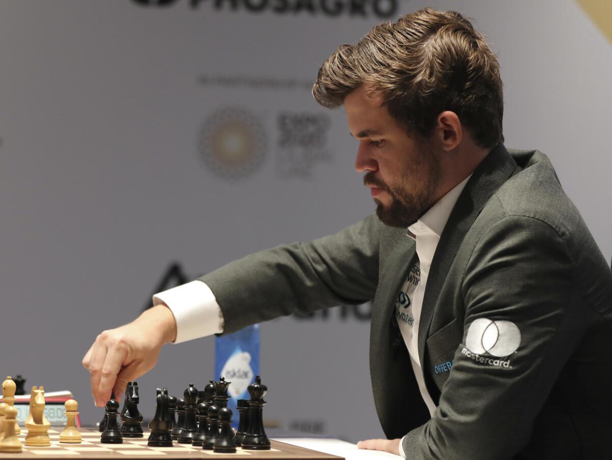 Magnus Carlsen Blows Ian Nepomniachtchi Away to Claim Fifth Chess World  Title - News18