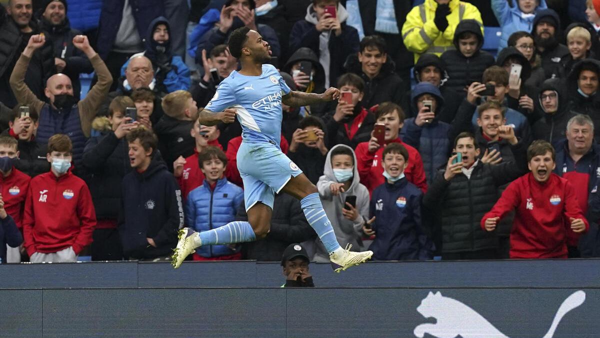 Sterling penalty earns Man City win over 10-man Wolves