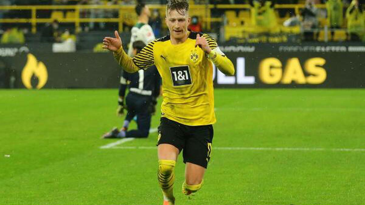 Reus gets two goals, three assists as Dortmund trounce Gladbach