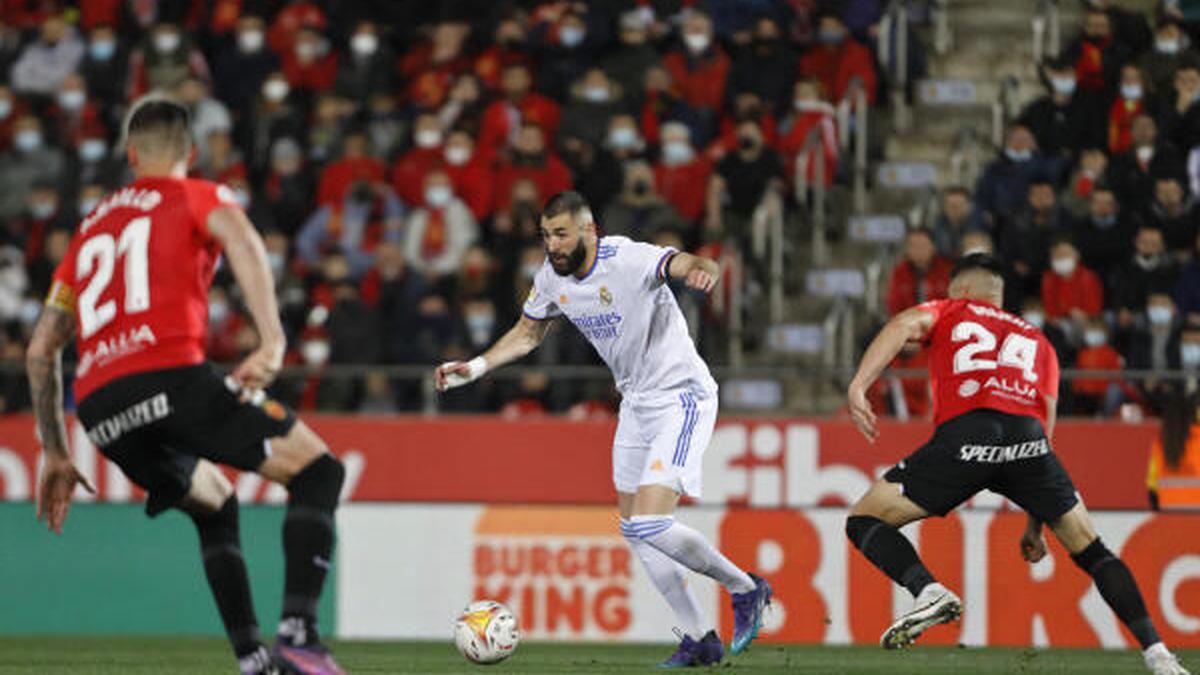 Benzema scores twice but hurts calf as Real extend LaLiga lead