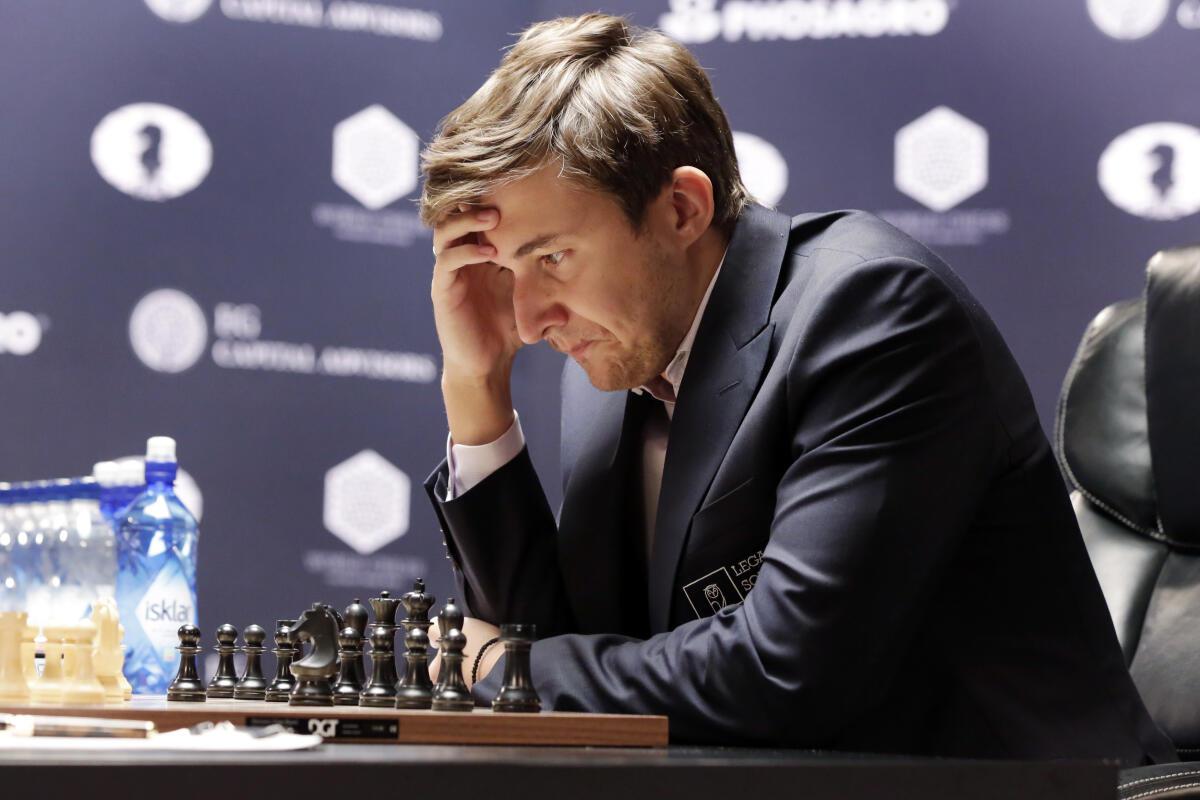 Russian chess champion Sergey Karjakin suspended for pro-war comments : NPR