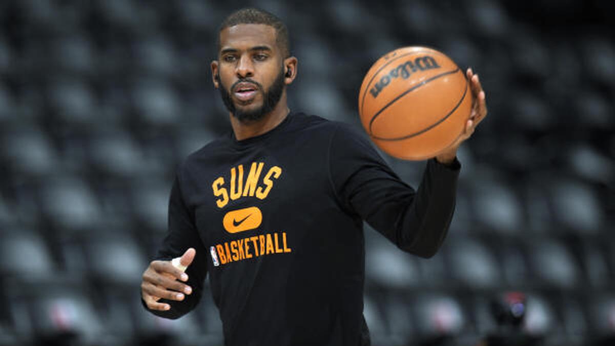 Paul returns, Suns beats Nuggets to wrap up NBA's top seed