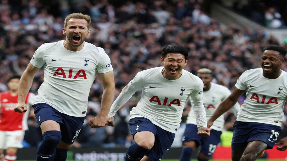 Premier League: Kane double and Son goal fire Tottenham to vital win over Arsenal