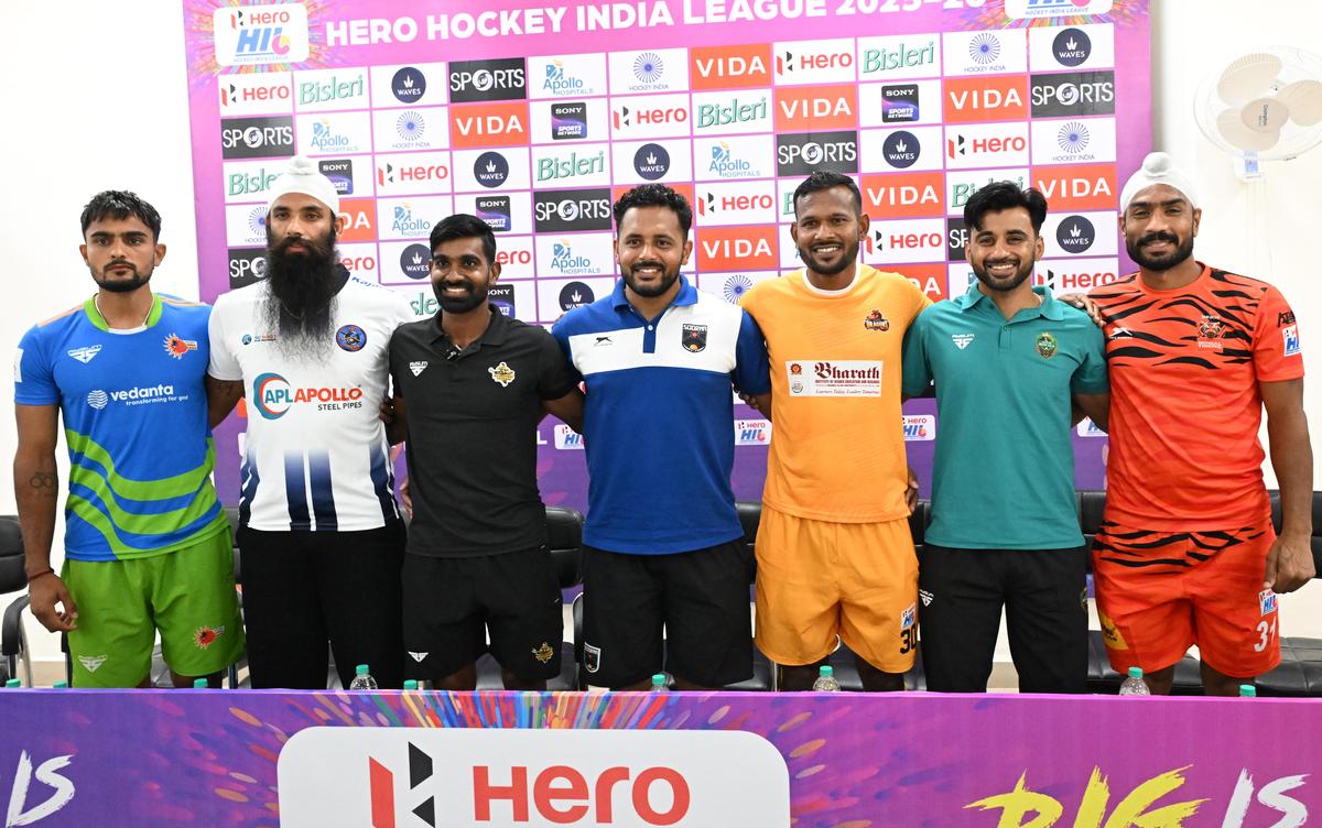 The captains of Hockey India League teams posing at the pre-tournament press conference.