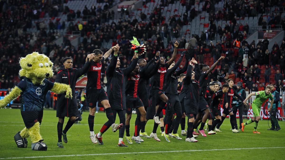 Leverkusen beats Mainz 2-1 to widen gap at top and set unbeaten record