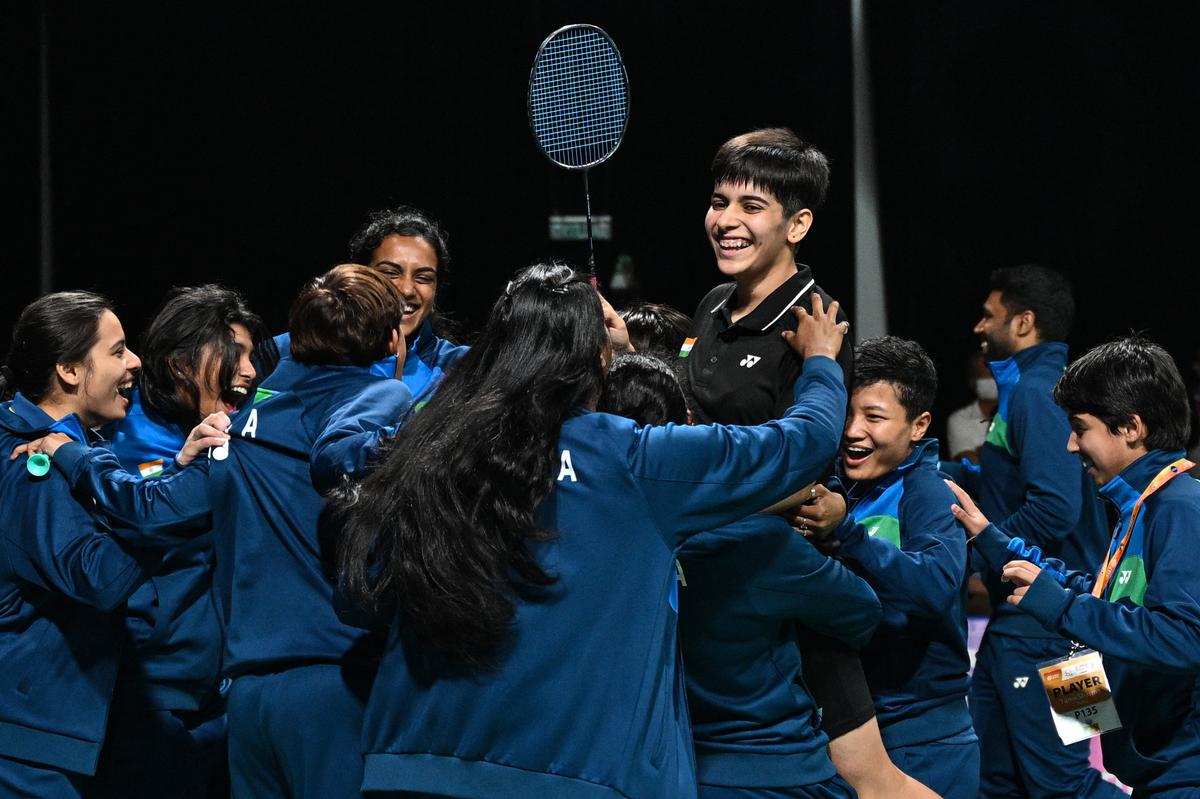 India’s Anmol Kharb (C) celebrates after winning against Thailand’s Pornpicha Choeikeewong in their women’s singles final match at the 2024 Badminton Asia Team Championships in Shah Alam, Selangor, on February, 18, 2024.