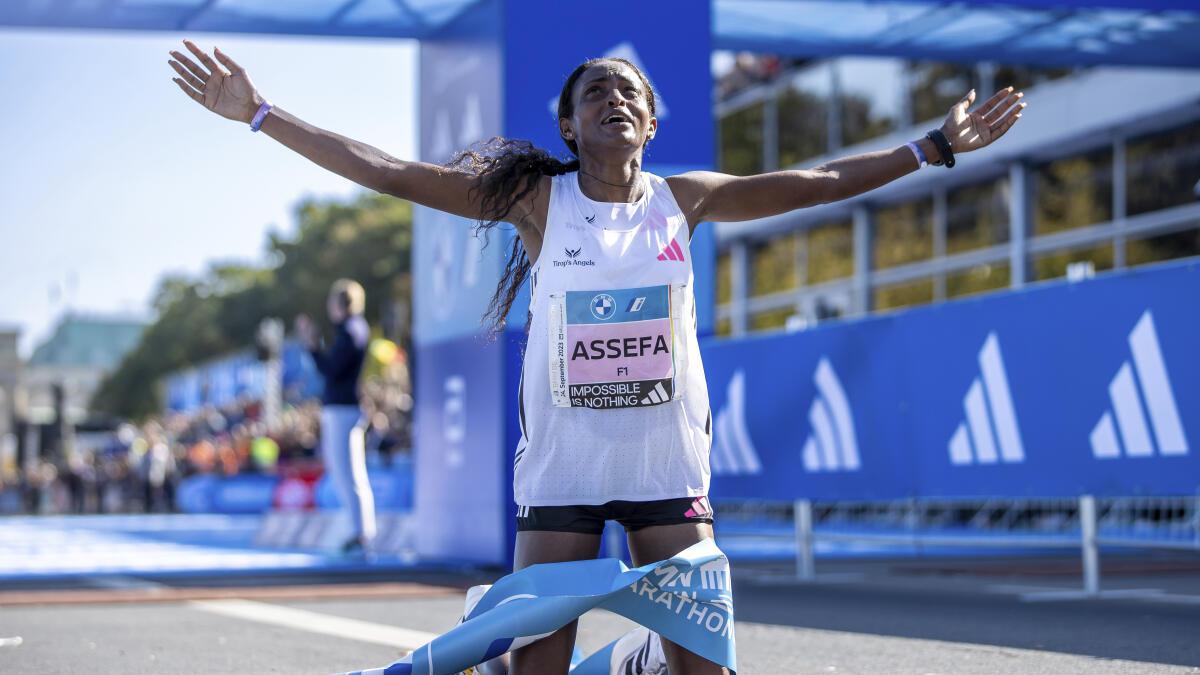 Tigst Assefa smashes women’s marathon world record in Berlin