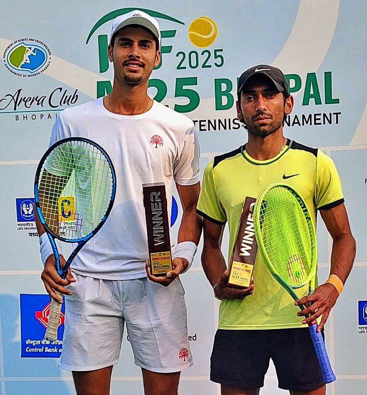 Doubles champions Chirag Duhan and Dev Javia in the ITF men’s tennis tournament in Bhopal on Saturday.