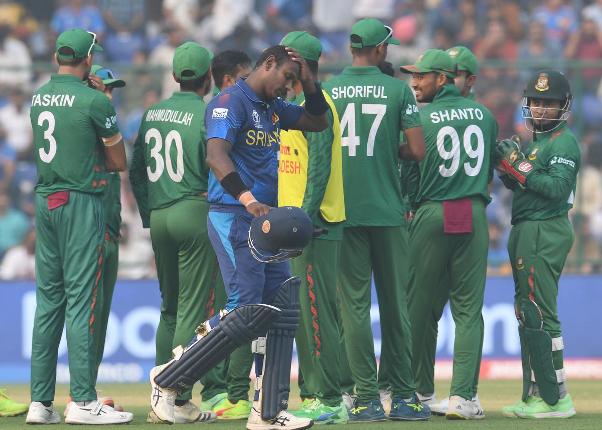 Srilankan batsman Angelo Mathews walks back after being given Timed Out during the ICC Cricket World Cup 2023 match against Bangladesh.