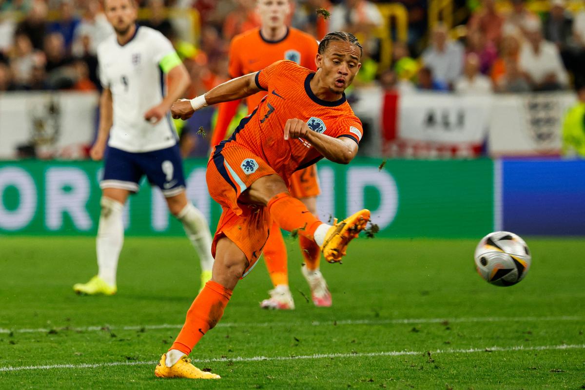 Netherlands’ forward Xavi Simons shoots.