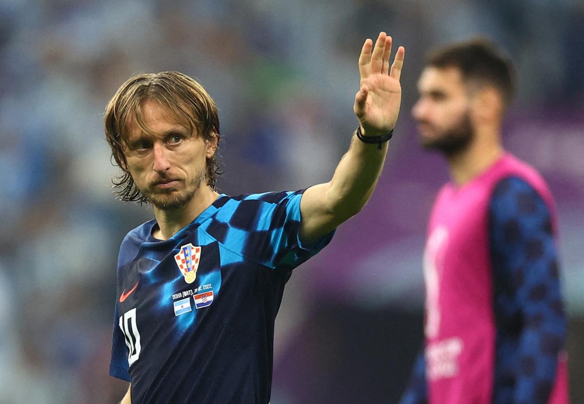 FILE PHOTO: Croatia’s Luka Modric waves to the fans after the FIFA World Cup 2022 semifinal against Argentina. 