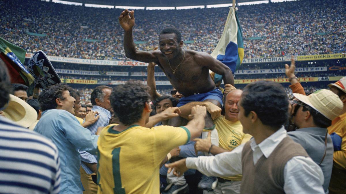 Pele, Brazil World Cup winner and football great, dies aged 82