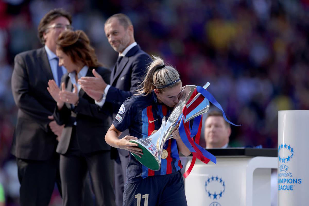 Alexia Putellas of FC Barcelona kisses the UEFA Women’s Champions League Trophy after the team’s victory during the UEFA Women’s Champions League final match between FC Barcelona and VfL Wolfsburg at PSV Stadion.