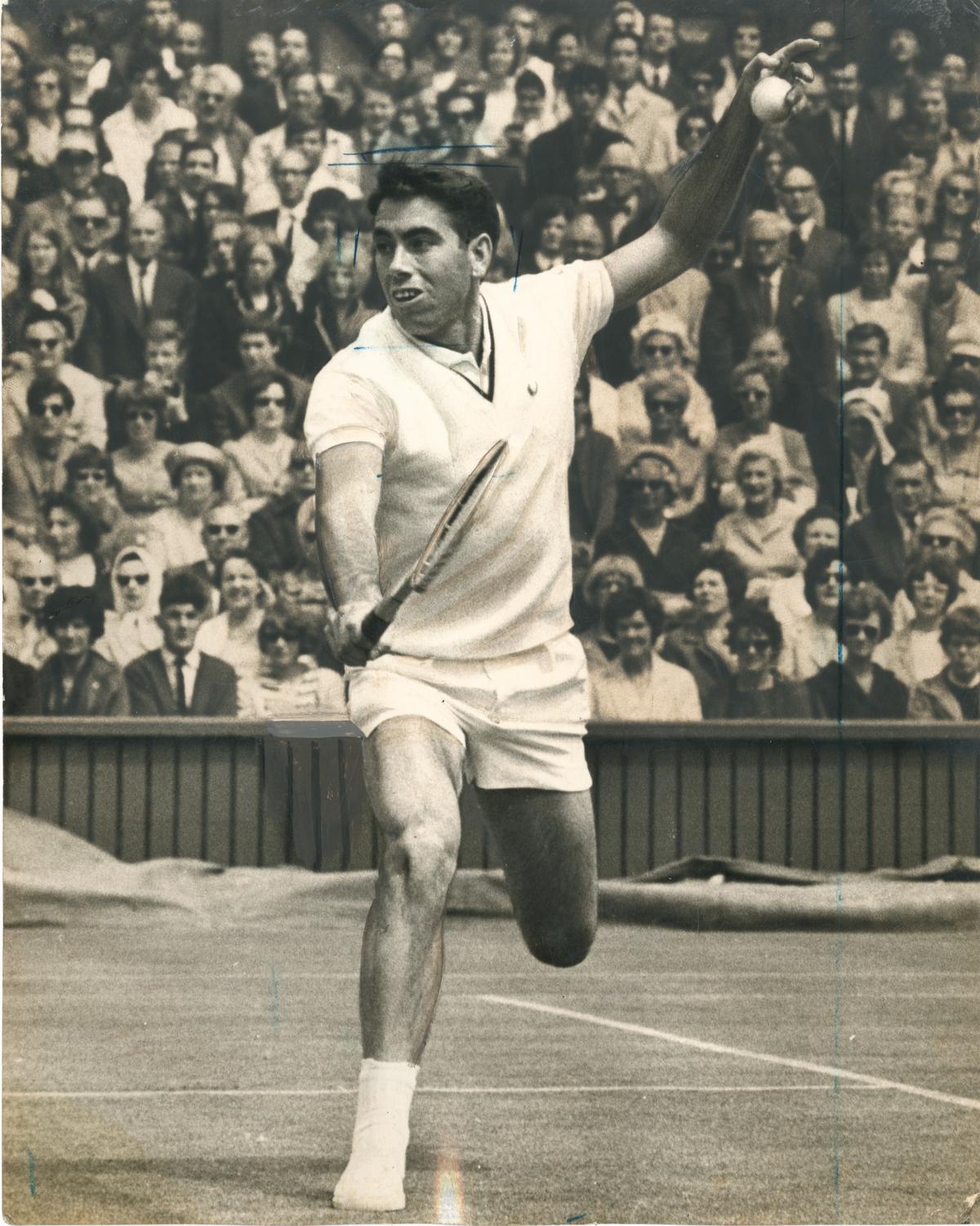 Spain’s Manuel Santana in action against USA’s Charlie Pasarell in first round of the Wimbledon championships on June 26, 1967.