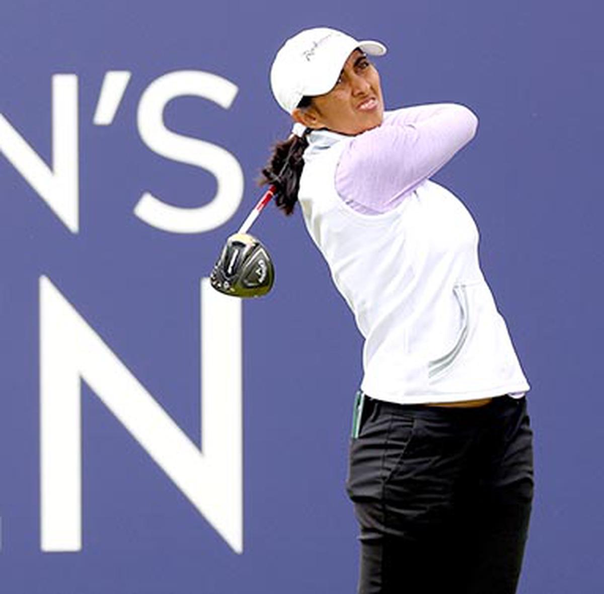 FILE PHOTO: Aditi Ashok of India plays her tee shot on the 1st hole on Day Three of the AIG Women’s Open at Walton Heath Golf Club on August 12, 2023 in Tadworth, England. 
