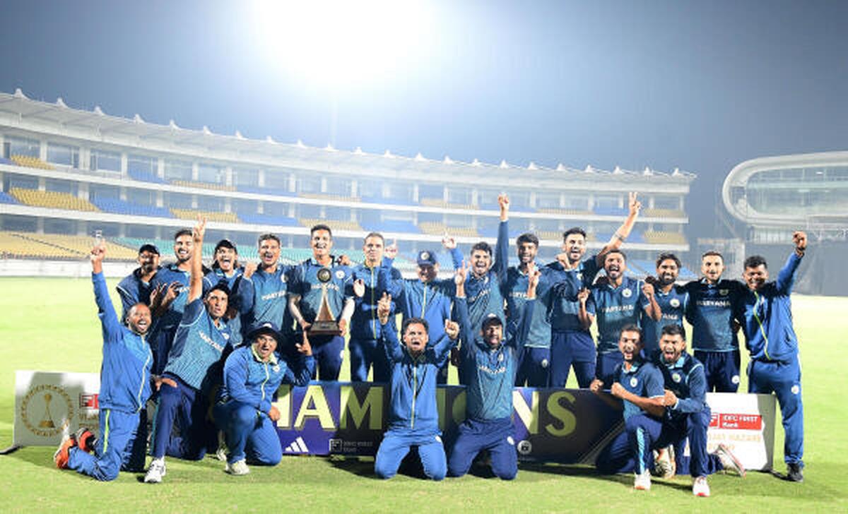 Haryana team with the Vijay Hazare Trophy after they beat Rajasthan. 