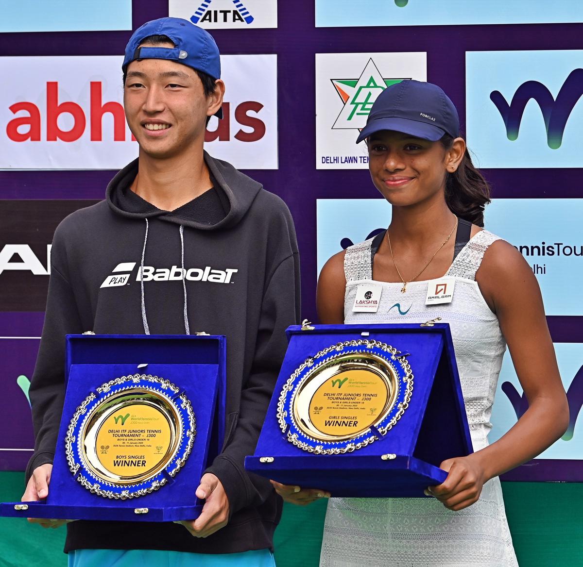 Photo of, Champions Donghyun Hwang and Maaya Rajeshwaran in the ITF
junior tennis tournament in Delhi on Saturday.