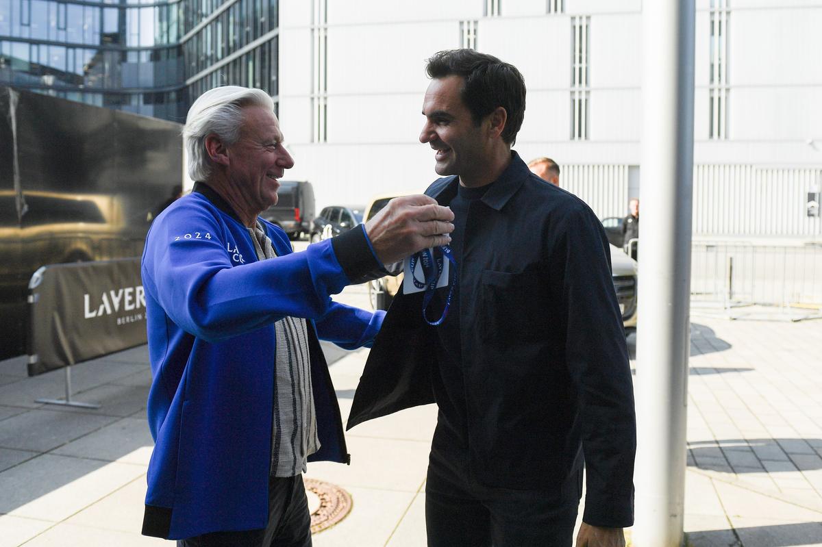 Captain Björn Borg of Team Europe and Roger Federer greet each other ahead of the Laver Cup at Uber Arena on September 17, 2024 in Berlin, Germany. 