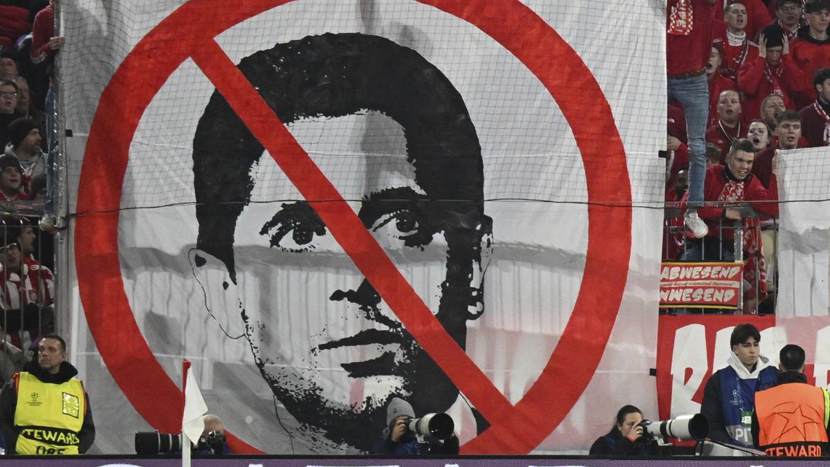 Bayern Munich apologises after fans display banner attacking PSG president Al-Khelaifi