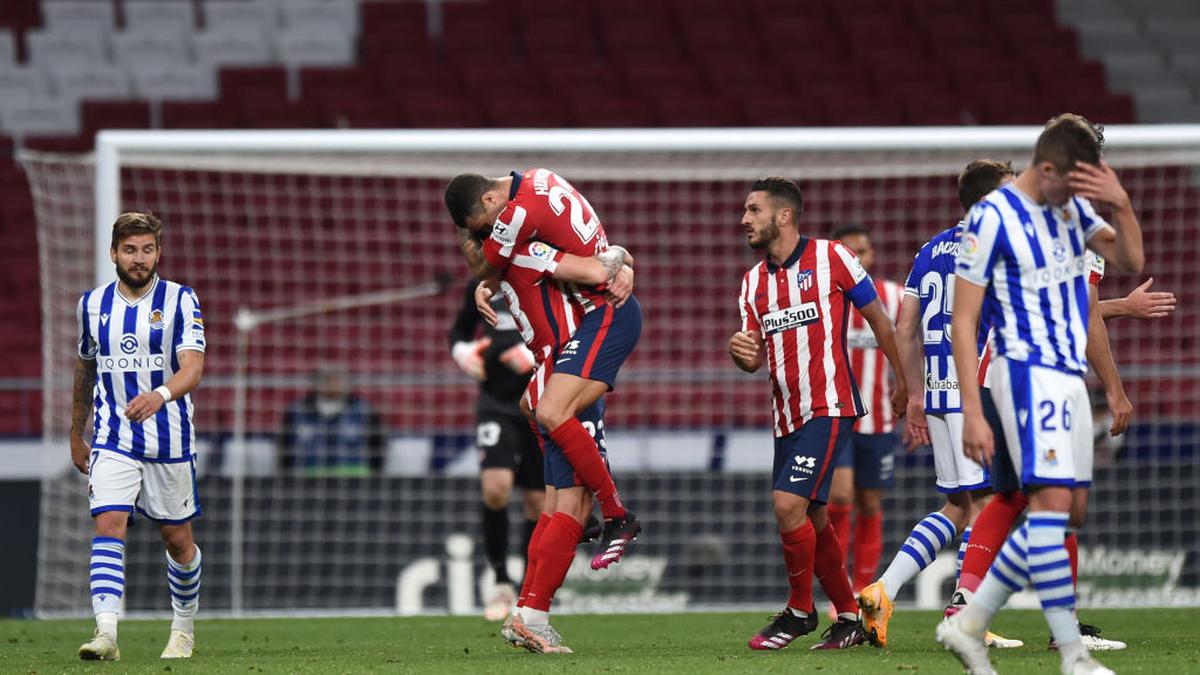 Atletico nears La Liga title with Sociedad win, Sevilla pips Valencia