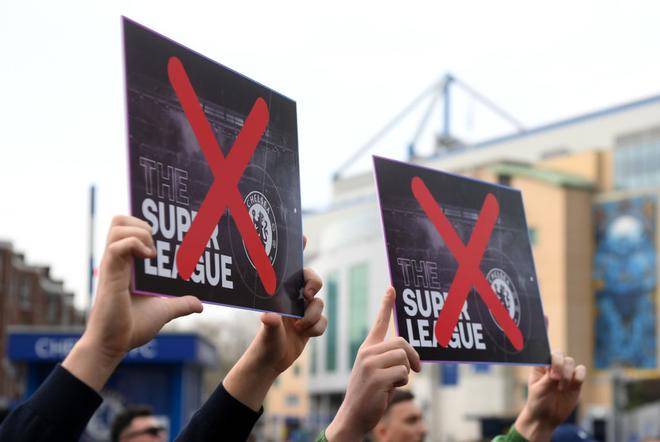 Chelsea fans protest against the newly proposed European Super League prior to the Premier League match at Stamford Bridge.