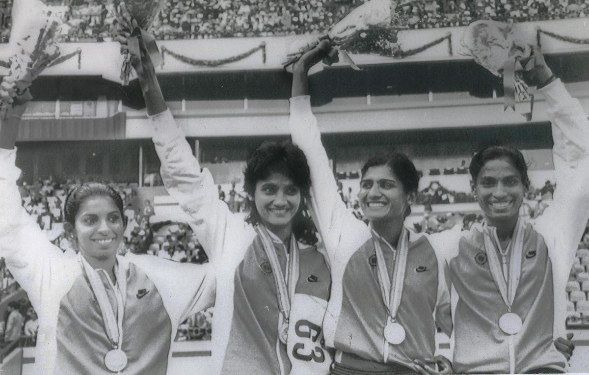 The Asian Games record-setting women's 4 x 400 metre relay team from India poses on the victory stand after their final race in Seoul on October 05, 1986. Pictured are M.D. Valsamma, Vandana Rao, Shiny Kurishinkal Abraham and P.T. Usha.