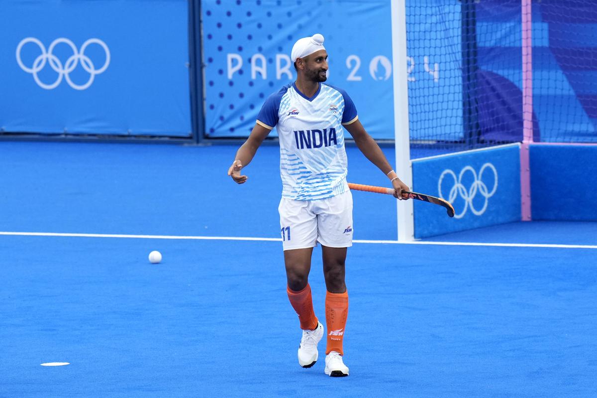 India’s Mandeep Singh celebrates after scoring his side’s first goal during the men’s Group B hockey match between India and New Zealand at the Yves-du-Manoir Stadium during the 2024 Summer Olympics, Saturday, July 27, 2024, in Colombes, France. 