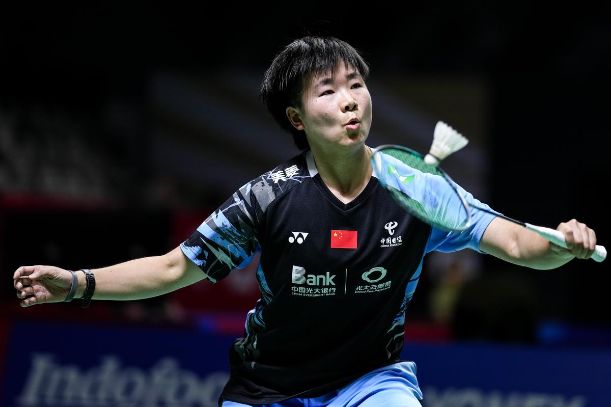 FILE PHOTO: He Bingjiao of China competes in the Women’s Singles First Round match against Line Hojmark Kjaersfeldt of Denmark during day one of the Indonesia Open.