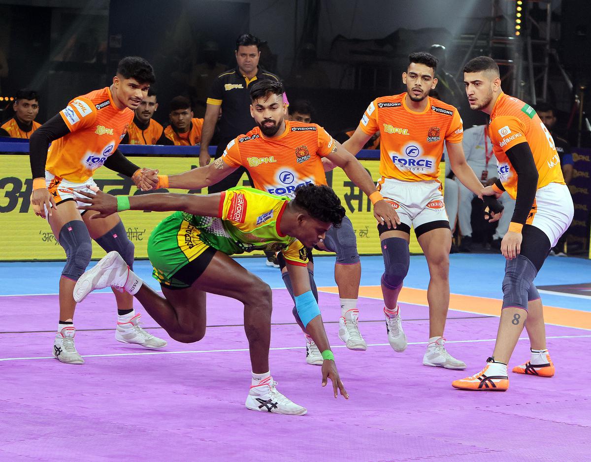 Puneri Paltans look to defend against a raid in the Pro Kabaddi League match against Patna Pirates in Chennai.