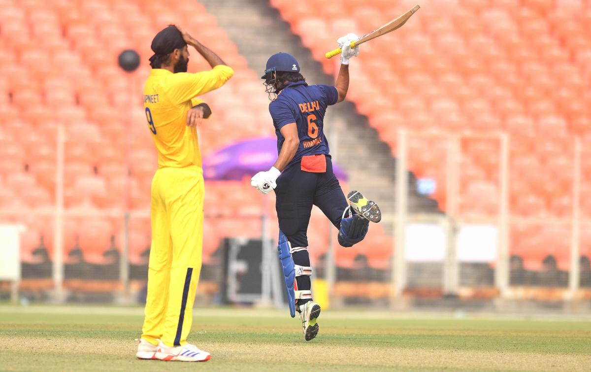 Delhi's Himmat Singh celebrates after hitting the winning six during a Syed Mushtaq Ali Trophy match against Tamil Nadu. 