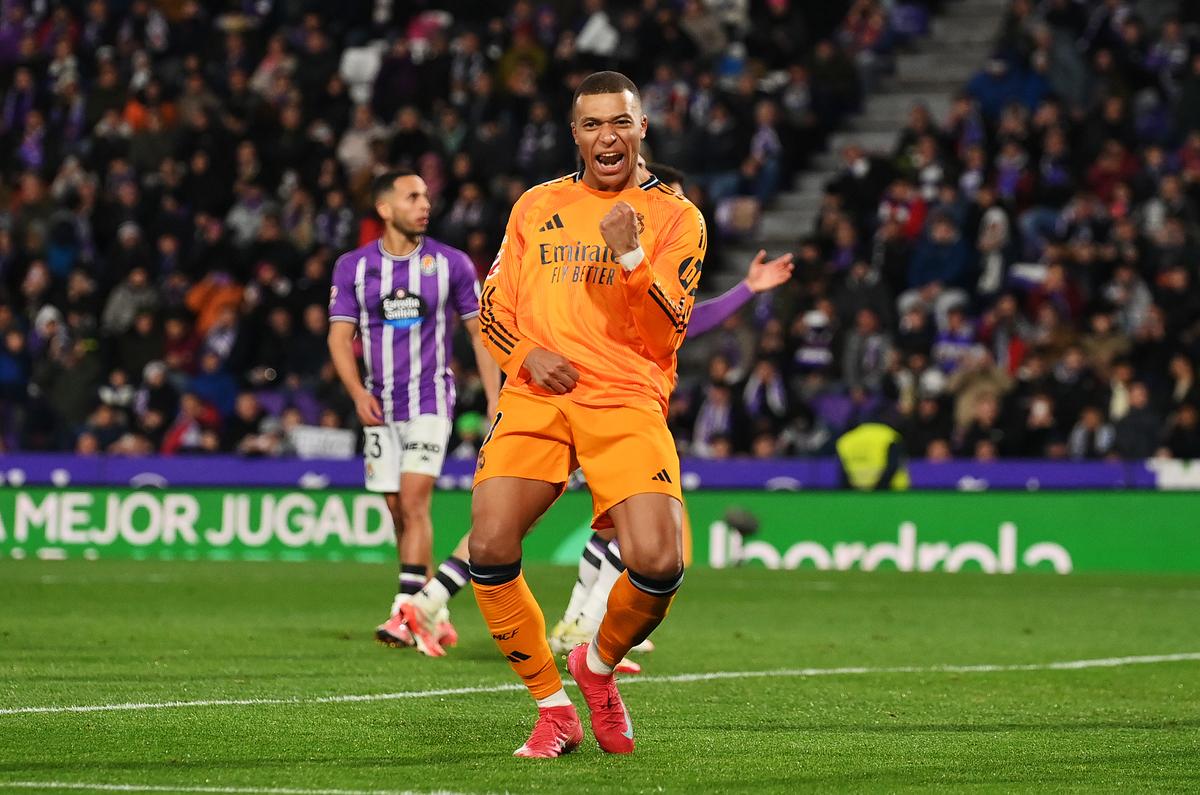 Mbappe of Real Madrid celebrates scoring his team’s third goal and his hat-trick goal from a penalty kick during the LaLiga match between Real Valladolid CF and Real Madrid CF at Jose Zorrilla on January 25, 2025 in Valladolid, Spain.